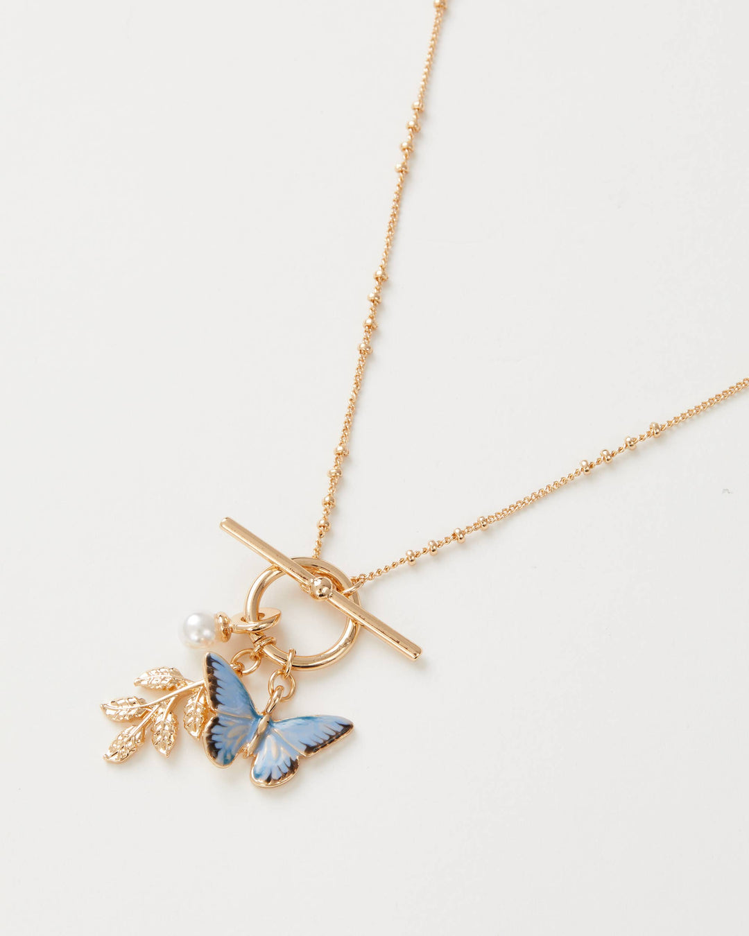 Fable England - FABLE Enamel Blue Butterfly & Leaf Charm Necklace